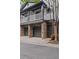 A view of the townhome exterior with brick and gray siding at 221 Semel Nw Dr # 273, Atlanta, GA 30309