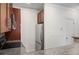Kitchen with stainless steel appliances, granite countertops and dark wood cabinets at 221 Semel Nw Dr # 273, Atlanta, GA 30309