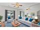Bright living room featuring a large mirror, plush seating, and stylish decor at 221 Semel Nw Dr # 273, Atlanta, GA 30309