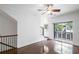 Bright living room with dark hardwood floors and walk out patio at 221 Semel Nw Dr # 273, Atlanta, GA 30309