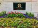 Attractive community signage with colorful floral landscaping enhances curb appeal at 221 Semel Nw Dr # 273, Atlanta, GA 30309