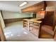 Finished basement with wood trim, bar area, and access to the staircase at 2636 Whiteleigh Ne Ct, Atlanta, GA 30345