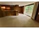 Finished basement with a vintage bar area and sliding glass doors at 2636 Whiteleigh Ne Ct, Atlanta, GA 30345