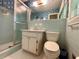 Functional bathroom featuring a shower, toilet, and vanity at 2636 Whiteleigh Ne Ct, Atlanta, GA 30345
