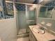 Clean bathroom featuring a tiled shower and vanity at 2636 Whiteleigh Ne Ct, Atlanta, GA 30345
