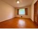 Inviting bedroom featuring hardwood floors and a bright window view at 2636 Whiteleigh Ne Ct, Atlanta, GA 30345
