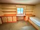 Bedroom with built-in shelves, desk, and storage, offering functionality at 2636 Whiteleigh Ne Ct, Atlanta, GA 30345