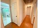 Hallway entrance to the bathroom with wood floors at 2636 Whiteleigh Ne Ct, Atlanta, GA 30345