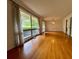 Inviting living room with gleaming hardwood floors and large windows at 2636 Whiteleigh Ne Ct, Atlanta, GA 30345