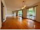 Bright living room with hardwood floors and multiple windows overlooking greenery at 2636 Whiteleigh Ne Ct, Atlanta, GA 30345