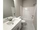 Clean bathroom featuring a sleek vanity with modern fixtures and a tub-shower combo at 5710 Urban Village Way # 6, Tucker, GA 30084
