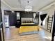 Modern bedroom with decorative ceiling and a large window at 590 Hood Ave, Fayetteville, GA 30214