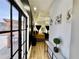 Bright bedroom features a black accent wall and a view of the backyard at 590 Hood Ave, Fayetteville, GA 30214