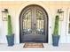 Elegant custom wrought iron front doors with sidelight windows and stylish hardware at 590 Hood Ave, Fayetteville, GA 30214
