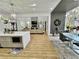 Open-concept living area connects the kitchen, dining, and living spaces for easy entertaining at 590 Hood Ave, Fayetteville, GA 30214