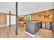 Finished basement boasts a bar, pool table, and neutral color palette for a welcoming entertainment space at 214 Kingsley Way, Woodstock, GA 30188