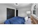 Bedroom features wood floors, neutral walls, and natural light from the windows at 3807 Greenhill Dr, Chamblee, GA 30341