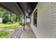 The exterior porch with rock features adds to the curb appeal of the home at 3807 Greenhill Dr, Chamblee, GA 30341