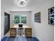 Bright office space with a modern desk, chair, and a window with outdoor views at 3807 Greenhill Dr, Chamblee, GA 30341