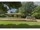 Community playground with swings and slides offer outdoor recreation in a serene, tree-filled environment at 3807 Greenhill Dr, Chamblee, GA 30341