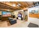 Finished basement features a movie screen, dartboard and a partially open ceiling at 515 Rosedown Way, Lawrenceville, GA 30043