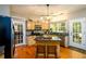 Charming kitchen featuring granite countertops, stainless appliances, and hardwood flooring at 515 Rosedown Way, Lawrenceville, GA 30043