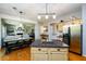 Well-designed kitchen featuring granite countertops and stainless steel appliances with an open layout at 515 Rosedown Way, Lawrenceville, GA 30043