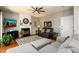 Bright living room showcasing a fireplace, comfortable seating, and an area rug at 515 Rosedown Way, Lawrenceville, GA 30043