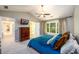 Spacious main bedroom features vaulted ceilings and a large window for natural light at 515 Rosedown Way, Lawrenceville, GA 30043