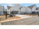 Rear exterior of a white home with a black metal fence surrounding the backyard at 517 Godfrey Dr, Cumming, GA 30040