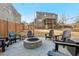 Backyard fire pit and seating area is great for entertaining and relaxing outside by the fire at 5305 Redfield Way, Cumming, GA 30028