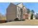 Large home with manicured landscaping and long driveway at 5305 Redfield Way, Cumming, GA 30028
