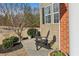 Relaxing front porch area with seating and landscaping at 5305 Redfield Way, Cumming, GA 30028