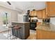 Eat in kitchen with granite counters and stainless appliances at 5305 Redfield Way, Cumming, GA 30028