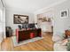 Bright office space with warm hardwood floors, neutral paint, and plenty of space to work at home at 5305 Redfield Way, Cumming, GA 30028