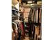 Organized walk-in closet with ample storage space for clothing, shoes, and accessories at 9405 Bandywood Dr, Covington, GA 30014