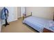 This bedroom has carpet flooring, neutral walls, and a bed with patterned bedding at 2826 Staunton Dr, Duluth, GA 30097