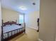 This bedroom has a bed with patterned bedding, carpet flooring and neutral walls at 2826 Staunton Dr, Duluth, GA 30097