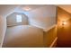 A large bonus room is featured with carpeted floors, base molding, and natural light at 2826 Staunton Dr, Duluth, GA 30097