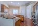 Updated kitchen offering granite countertops, an island, and stainless appliances at 2826 Staunton Dr, Duluth, GA 30097