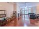 Spacious living room featuring hardwood floors, a fireplace, and large windows for ample natural light at 2826 Staunton Dr, Duluth, GA 30097