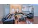 Inviting living space featuring hardwood floors and seamless flow to dining area at 2826 Staunton Dr, Duluth, GA 30097