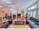 Large living room with hardwood floors, fireplace, and ample natural light at 2826 Staunton Dr, Duluth, GA 30097