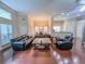 Spacious living room with hardwood floors that flows to the kitchen and dining area at 2826 Staunton Dr, Duluth, GA 30097