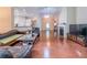 Spacious living room boasting a fireplace and seamless flow to the kitchen at 2826 Staunton Dr, Duluth, GA 30097
