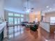 Open living area with hardwood floors, fireplace, and seamless flow to dining and kitchen at 2826 Staunton Dr, Duluth, GA 30097