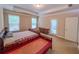 Main bedroom featuring a tray ceiling, and two windows for lots of natural light at 2826 Staunton Dr, Duluth, GA 30097