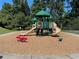 Community playground area featuring slides and play equipment for outdoor recreation at 2826 Staunton Dr, Duluth, GA 30097