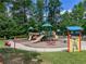 A neighborhood playground features multiple slides and various play areas for children to explore at 2826 Staunton Dr, Duluth, GA 30097