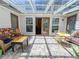 Sunroom features tiled floor and glass ceiling, offering natural light and outdoor views at 2826 Staunton Dr, Duluth, GA 30097